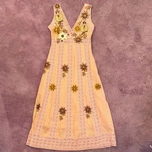 Peachy-pink midi hand embroidered dress.